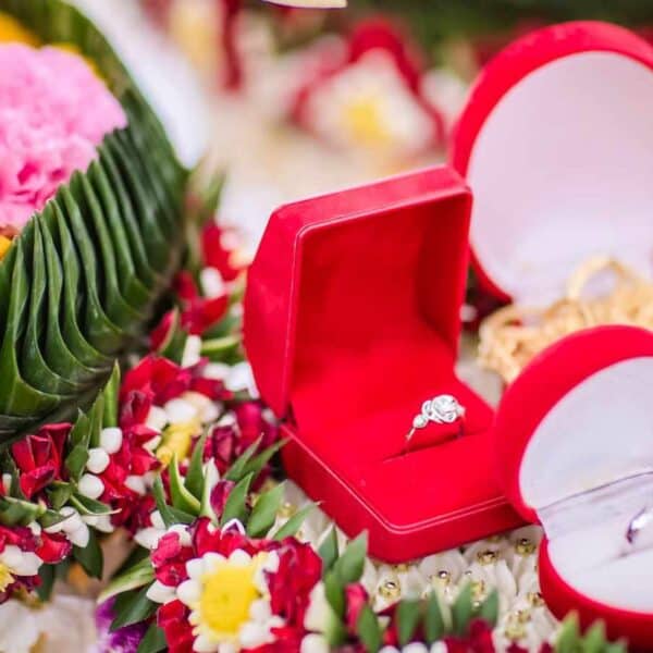 Dowry (gold necklace) on flower tray in Thai traditional wedding